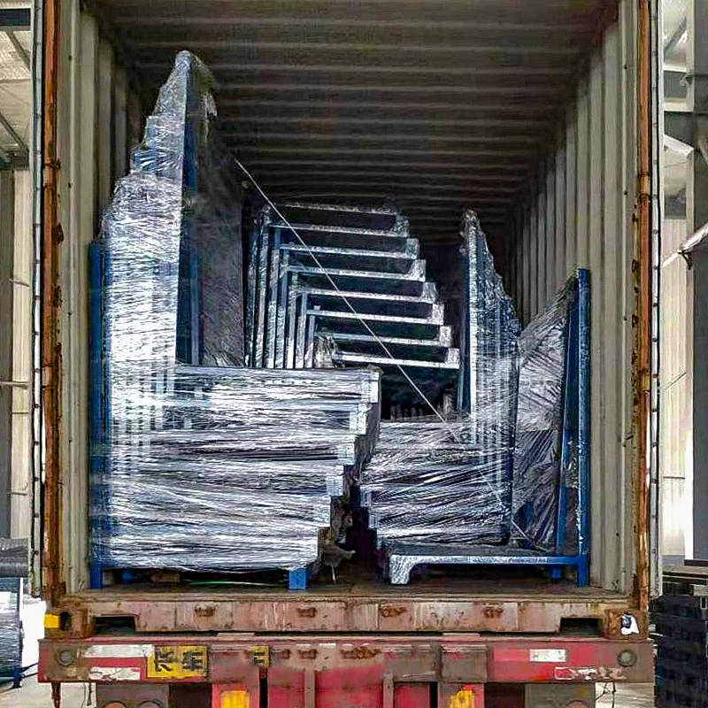 Shipping container fully packed with nested blue L-shape returnable steel glass racks for global export