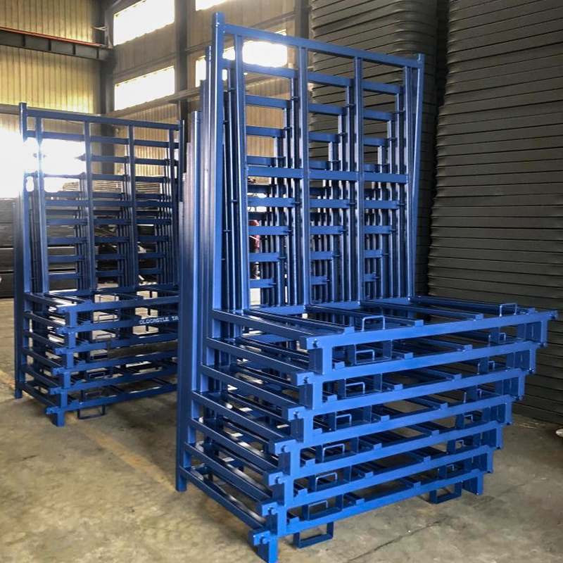 Bundled stack of nested blue L-frame glass storage racks ready for transport and reverse logistics